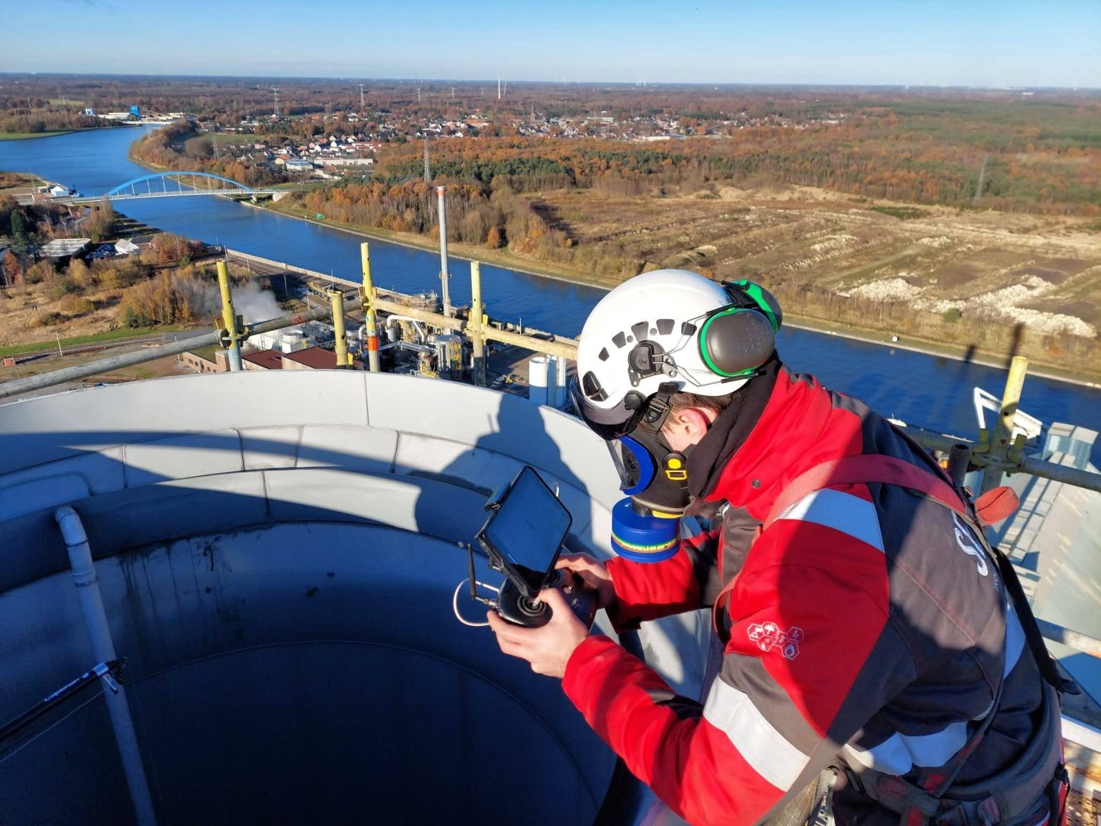 Sensor IDS pilot flying a drone from a chimney top above the Albert Canal